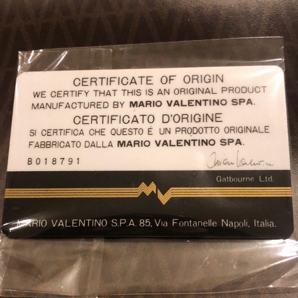 Mario Valentino Crossbody Bag
Mario Valentino
Size: 11 × 8 × 3.5 - Picture 11 of 11